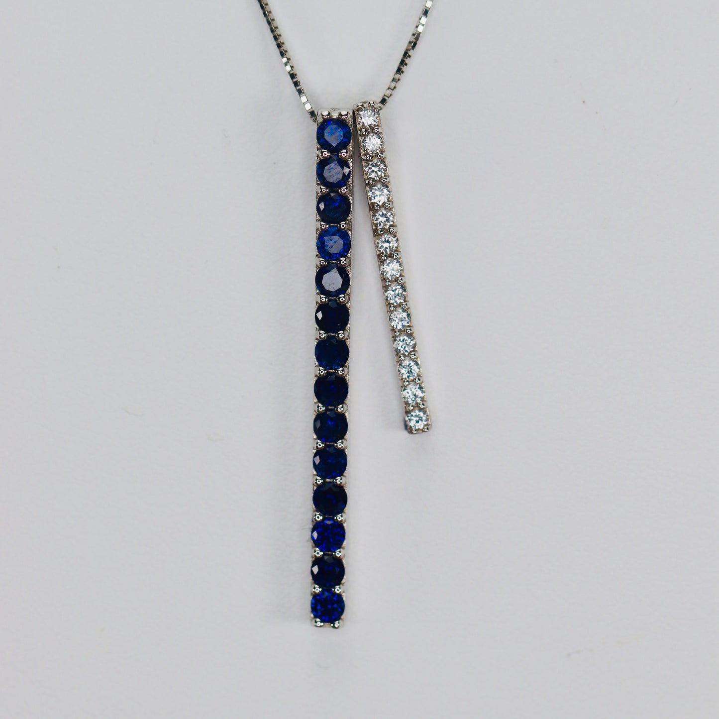Blue and white lab grown sapphire necklace in white gold